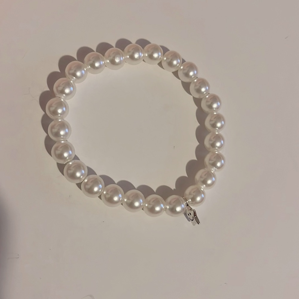 Pearl beaded bracelet with smile star charm